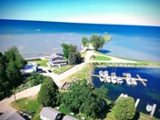 Grindstone Lighthouse on Lake Huron Private Beach