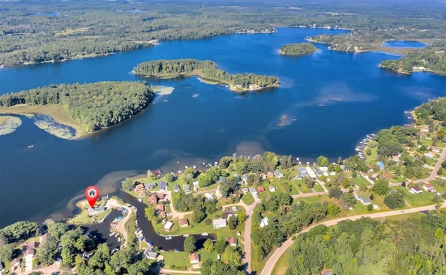 Aerial view of Zeron's Island surrounded by Sage Lake